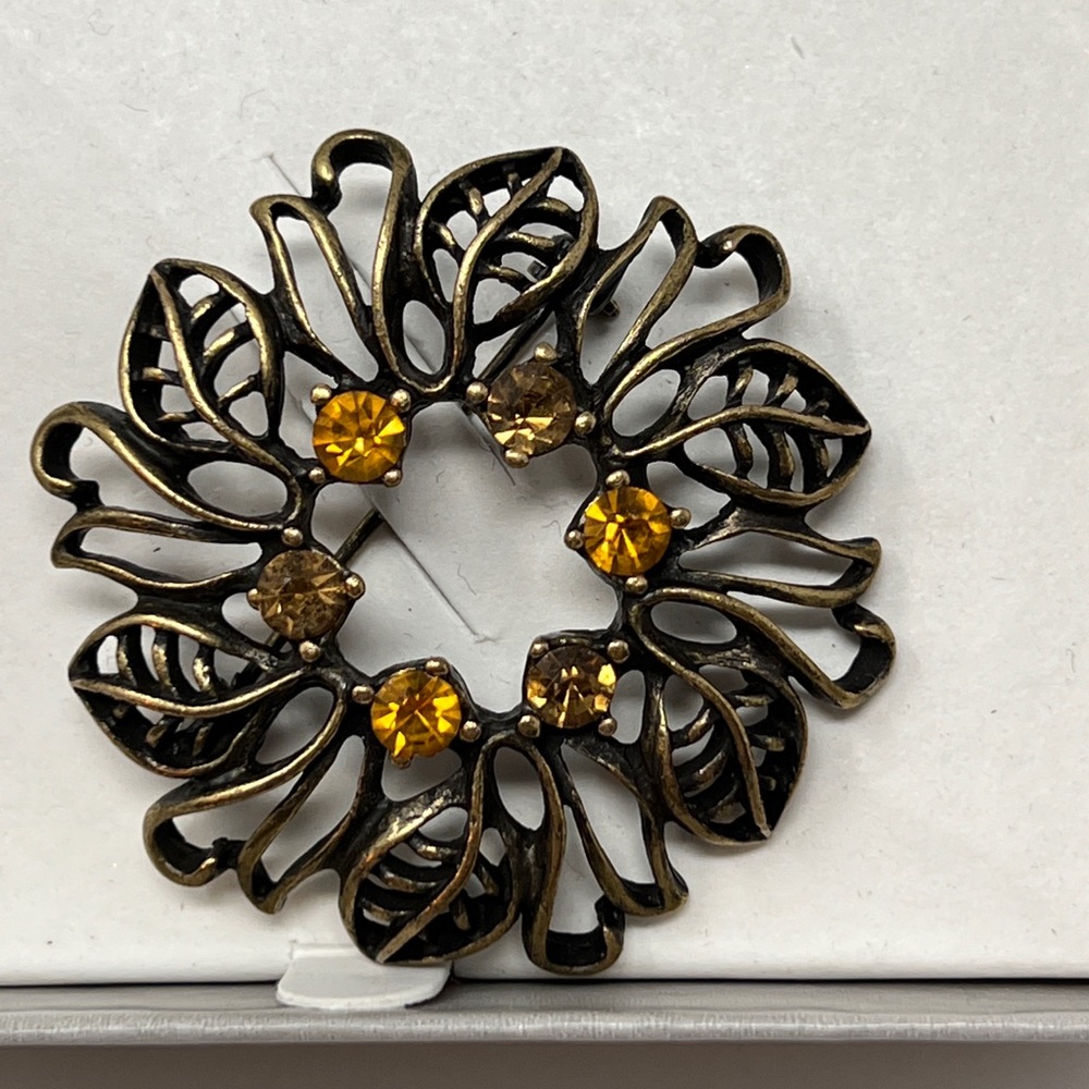 Villager brooch by Liz Claiborne